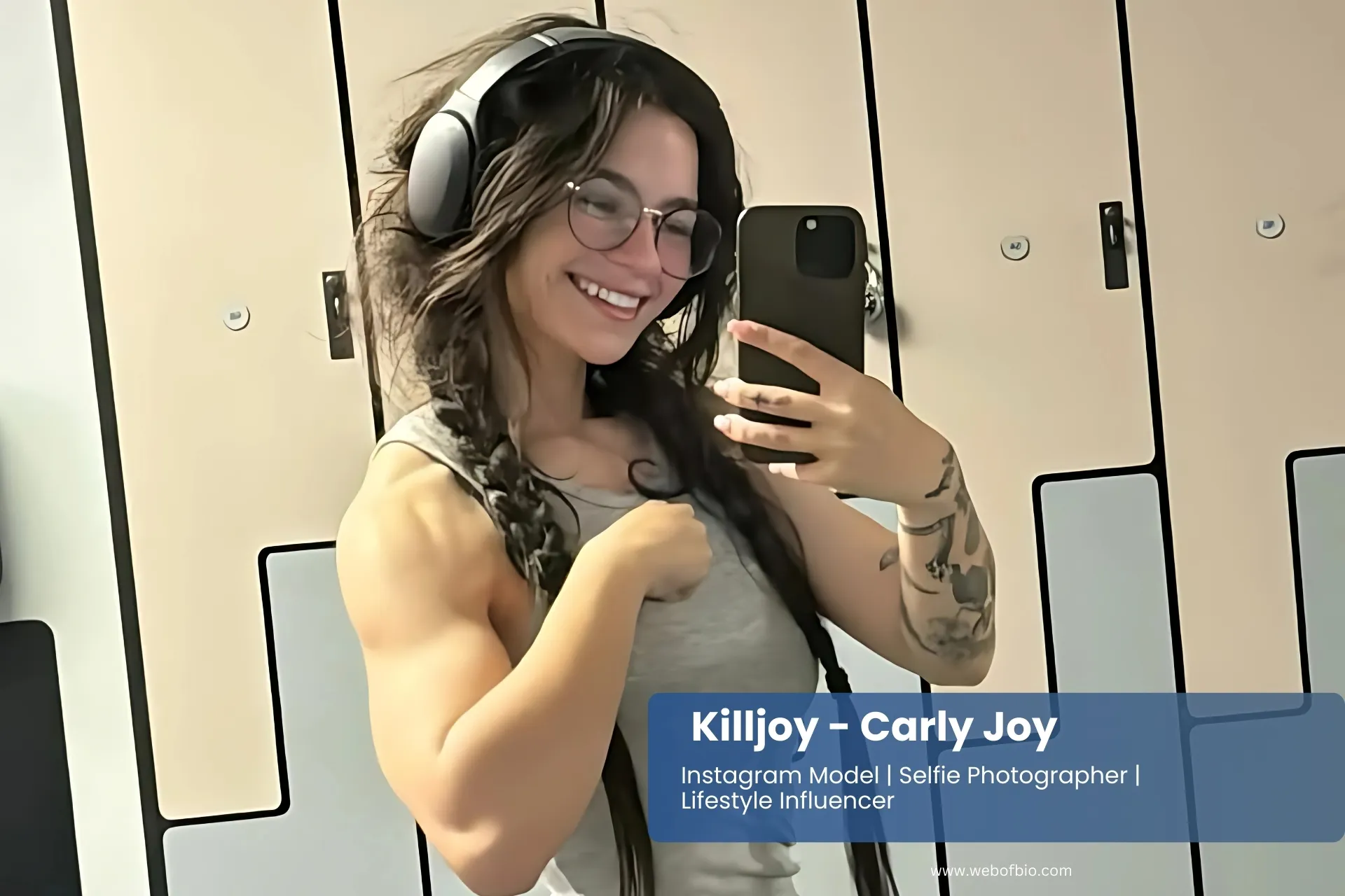 Killljoyy Carly flaunts bold tattoos and vibrant style in a TikTok-inspired selfie, celebrating individuality and social media creativity.