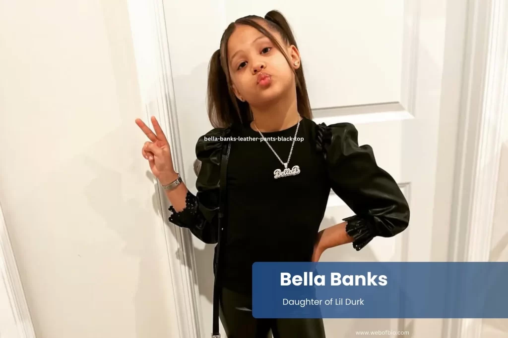 Bella Banks, wearing leather pants and a black top.