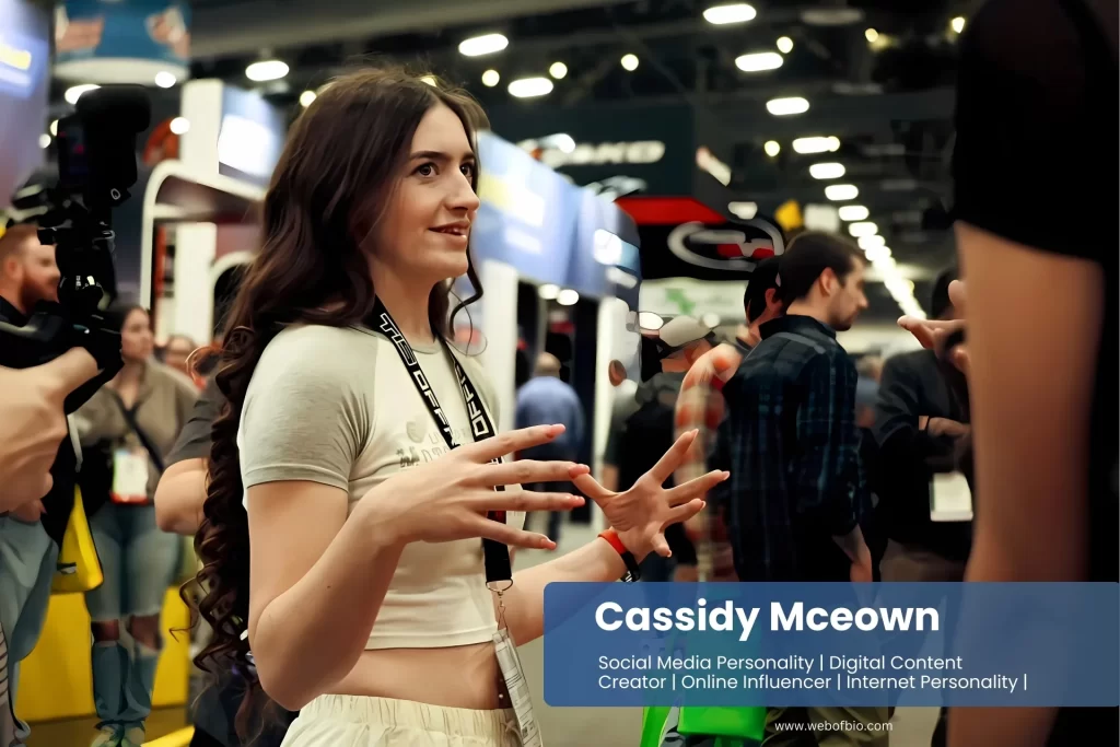 Cassidy Mceown talking to another person at a convention.