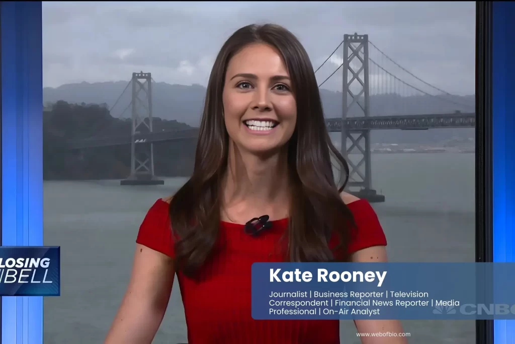 Kate Rooney, news reporter, in a studio setting.