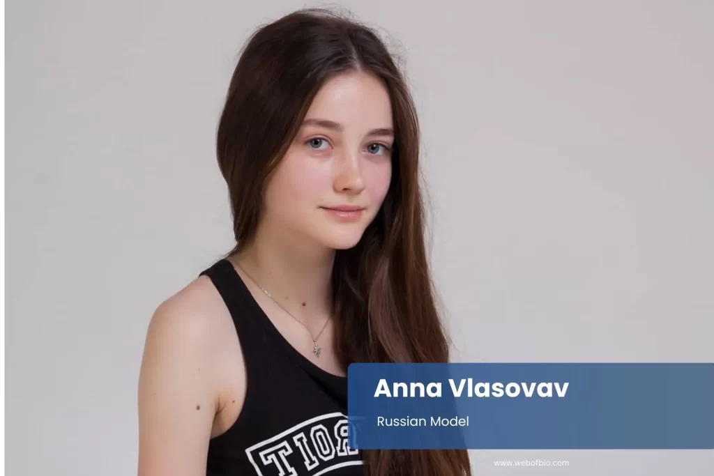 Anna Vlasovav in a plaid skirt and tank top stands smiling, showcasing her casual summer outfit.