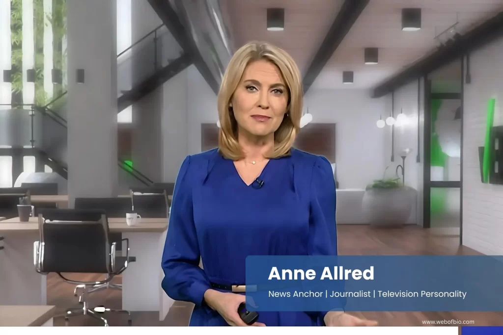 Anne Allred in a blue dress standing in front of an office.