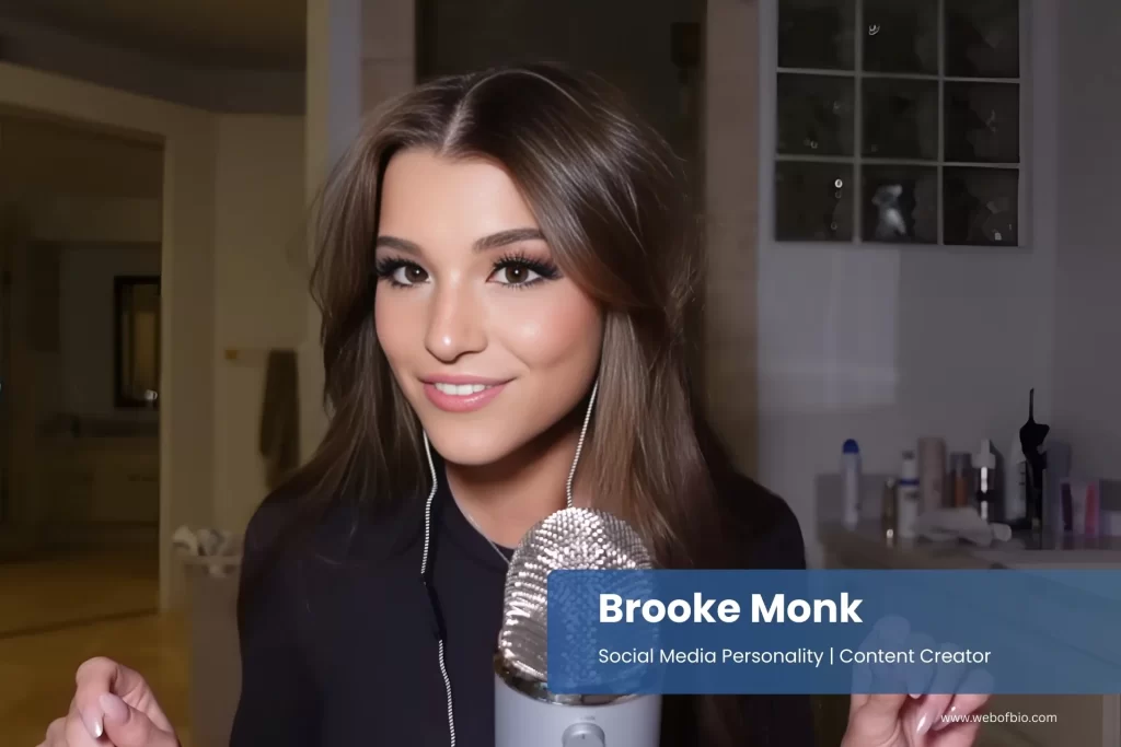 Brooke Monk holding a microphone.