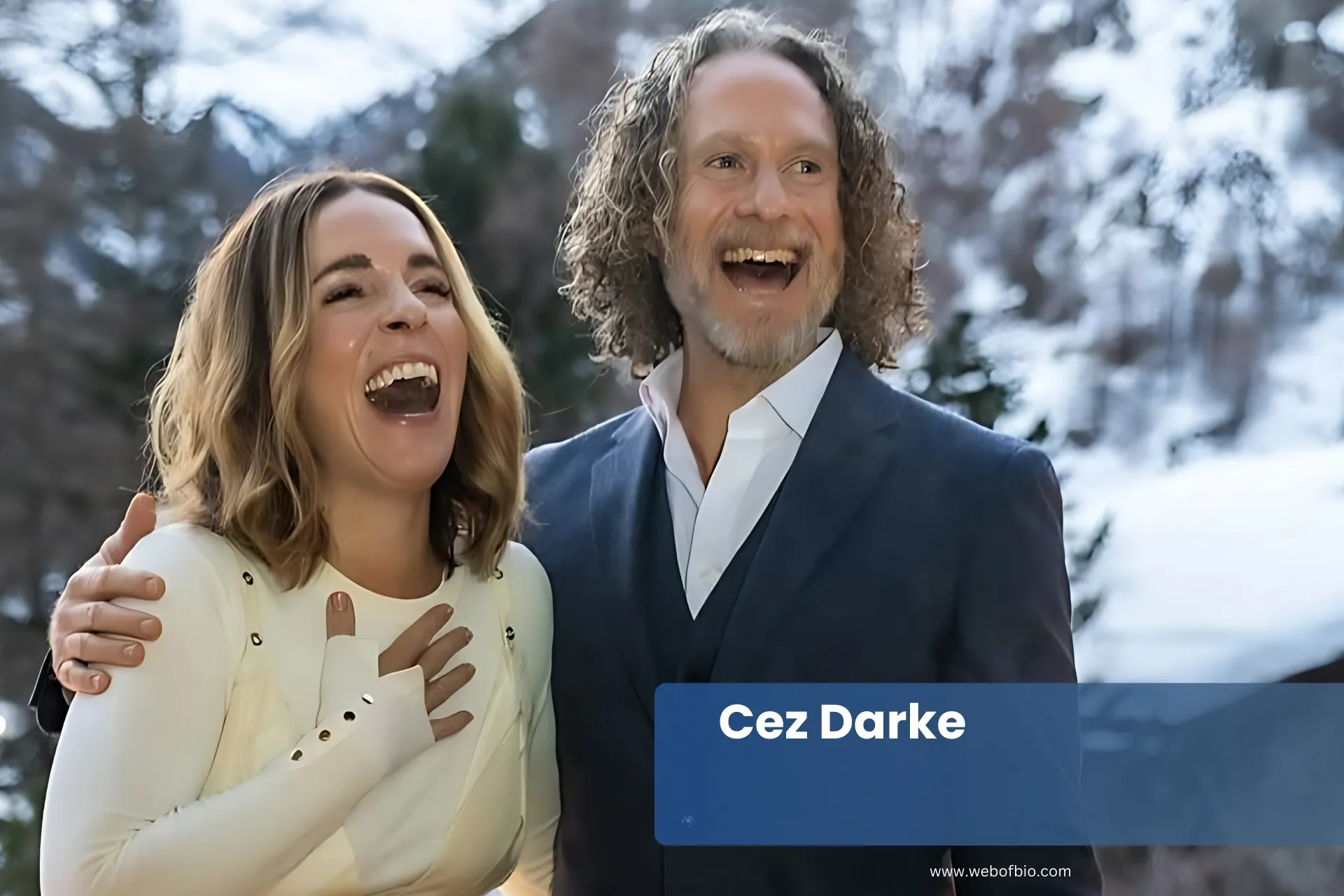 Cez Darke and Rachel Hollis smiling in snowy mountain scene.