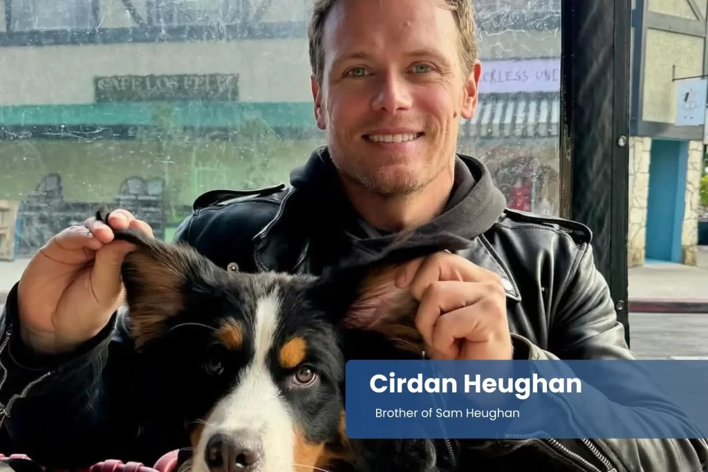 Cirdan Heughan, Sam Heughan's brother, sits in a car with a dog.
