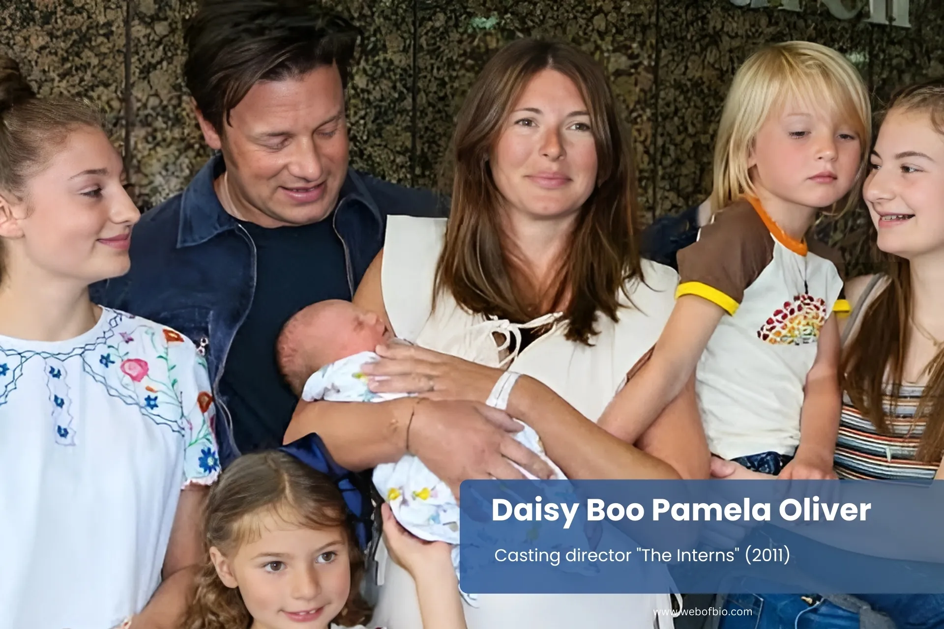 Daisy Boo Pamela Oliver and family smiling with newborn baby.