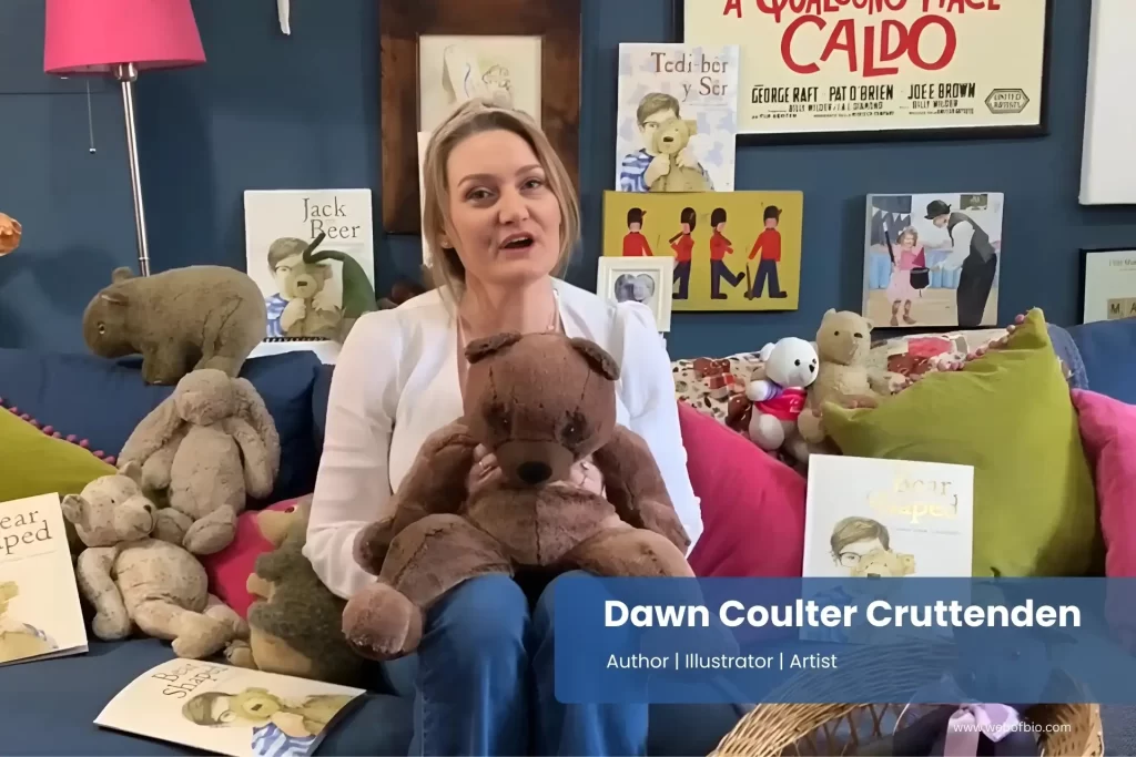 Dawn Coulter Cruttenden sitting on a couch holding a teddy bear.
