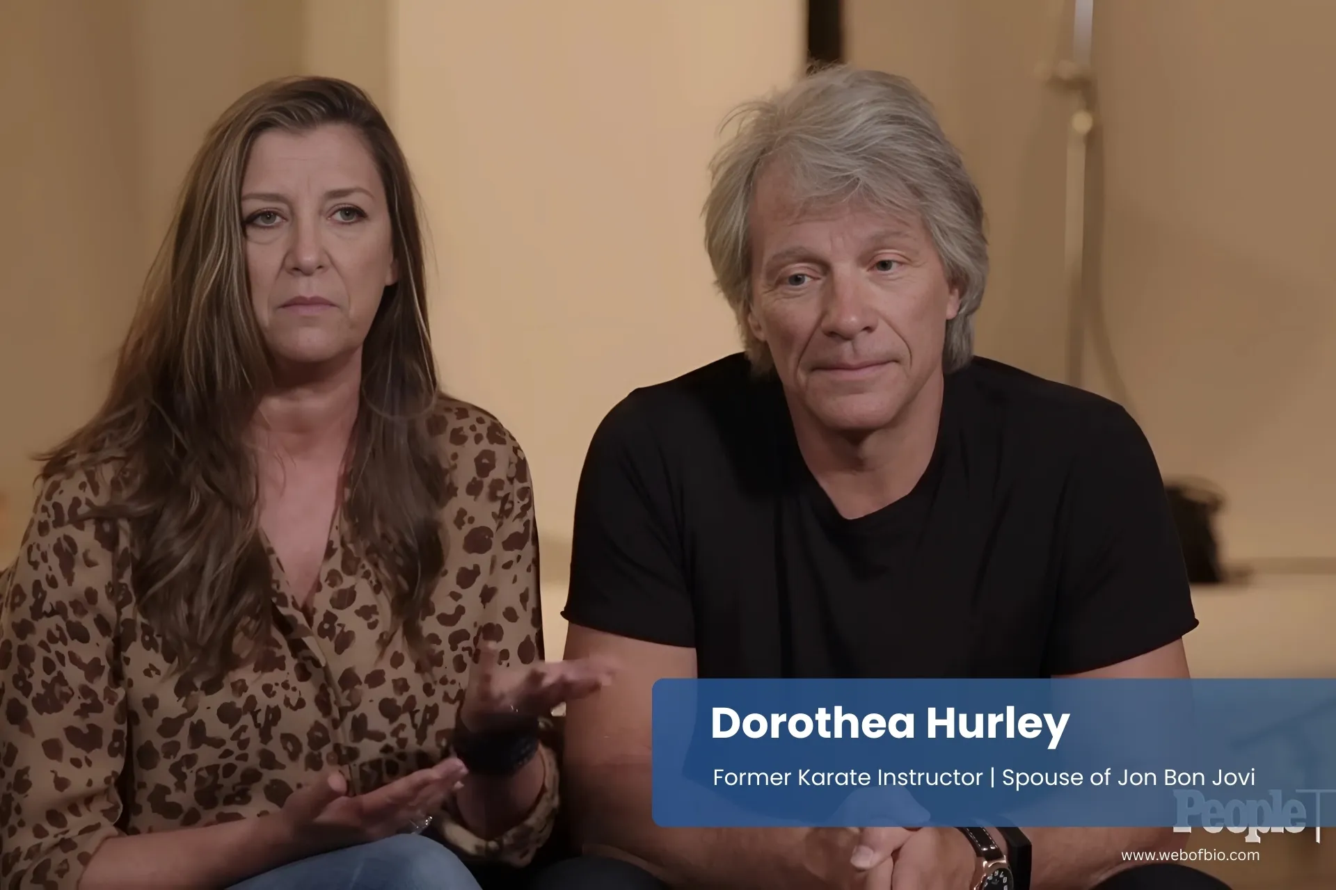 Dorothea Hurley and Jon Bon Jovi are sitting on a couch.