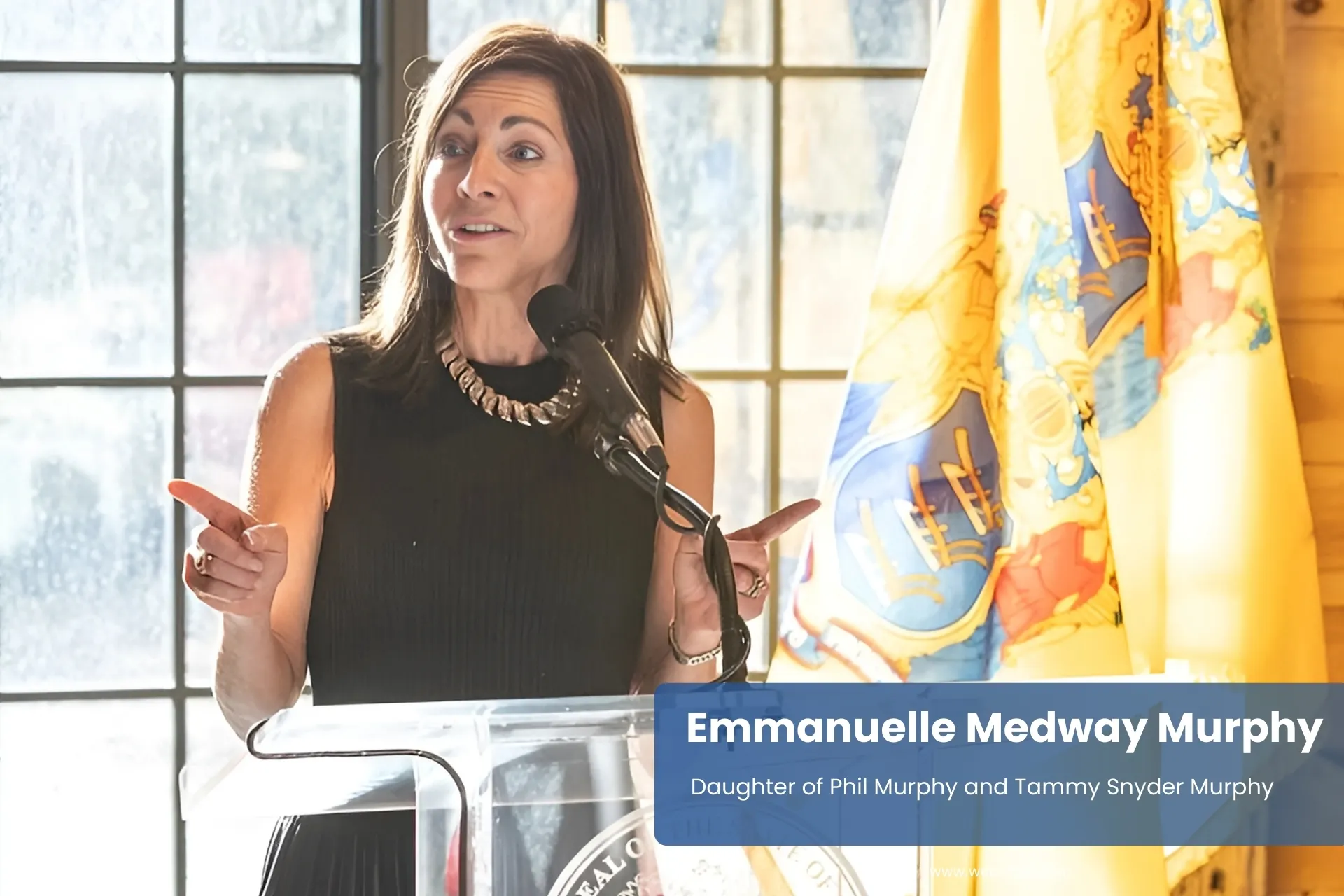 Emmanuelle Medway Murphy speaking at podium to audience.
