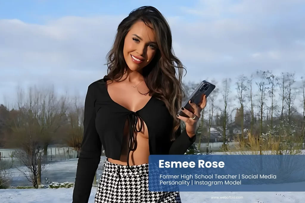 Esmee Rose standing in snow wearing shorts and boots.