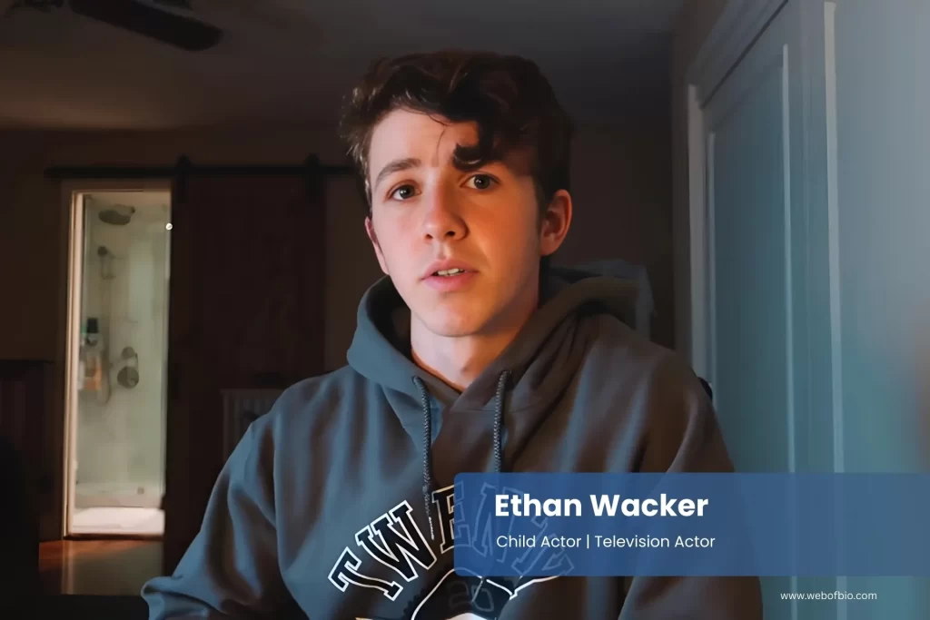 Ethan Wacker in a hoodie is looking at the camera.