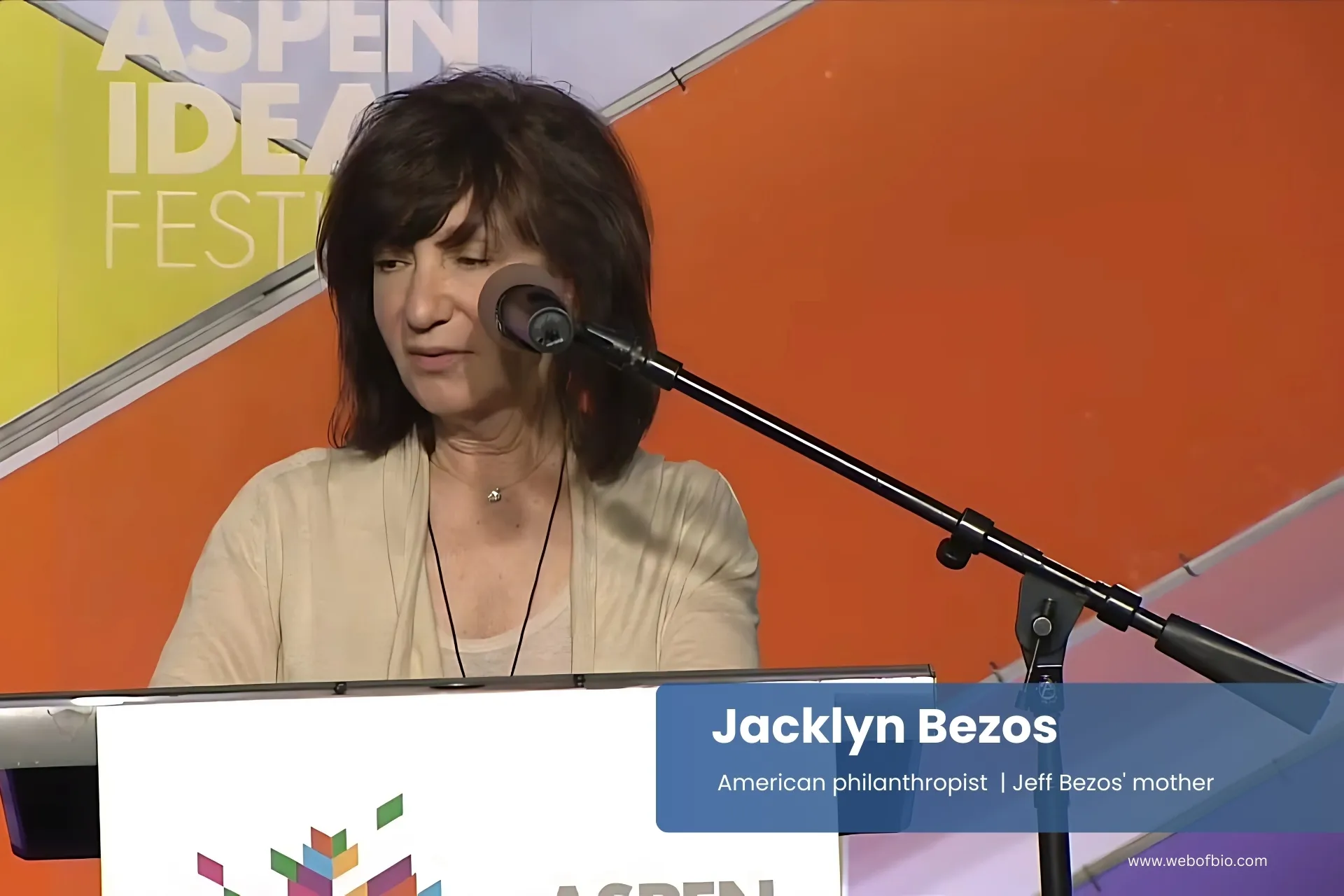 Jack Doherty speaking at a podium in front of an aspen ideas festival banner.