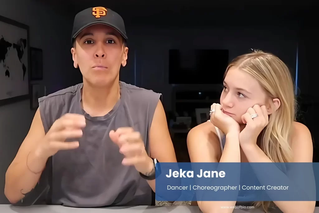 Jeka Jane and partner in conversation at a table.