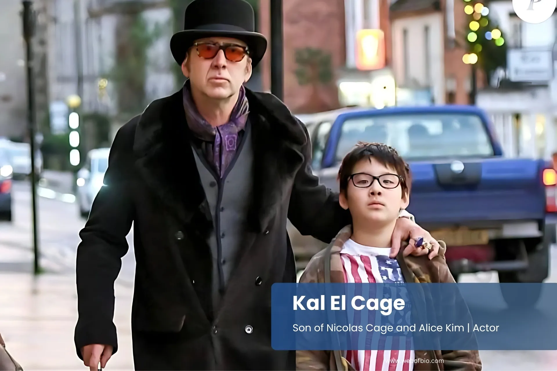 Kal El Cage father Nicolas Cage walking city street.