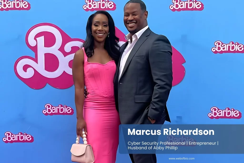 Marcus Richardson and his wife Abby Phillip smile together for a photo at the Barbie movie premiere, showcasing their stylish outfits.