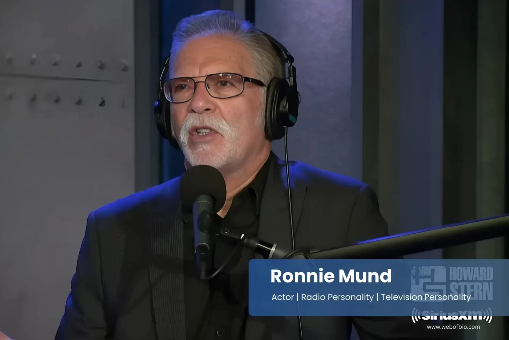 Ronnie Mund speaking into a microphone.