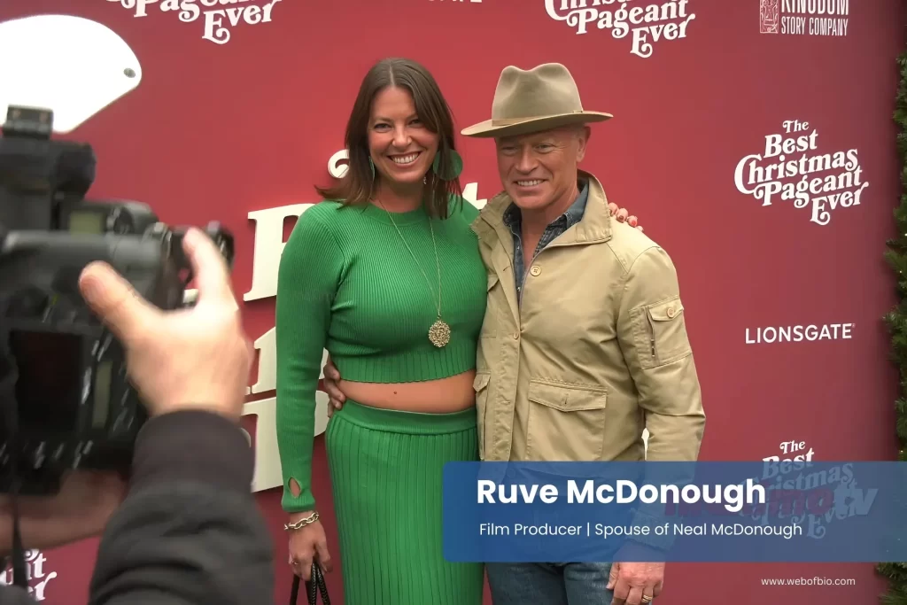 Ruve McDonough and Neal McDonough posing on the red carpet at an event.