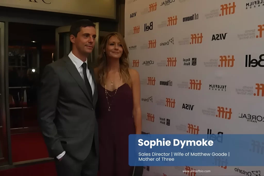 Sophie Dymoke and Matthew Goode standing on a red carpet.