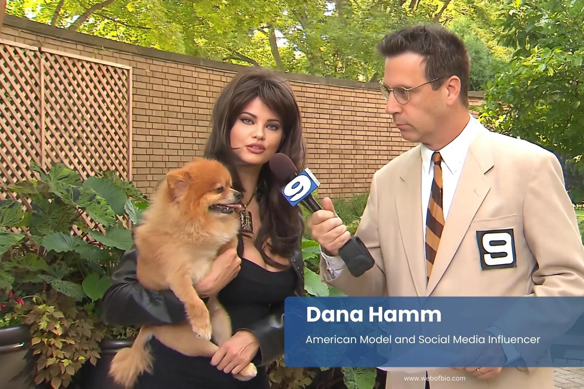 Dana Hamm holding small dog.