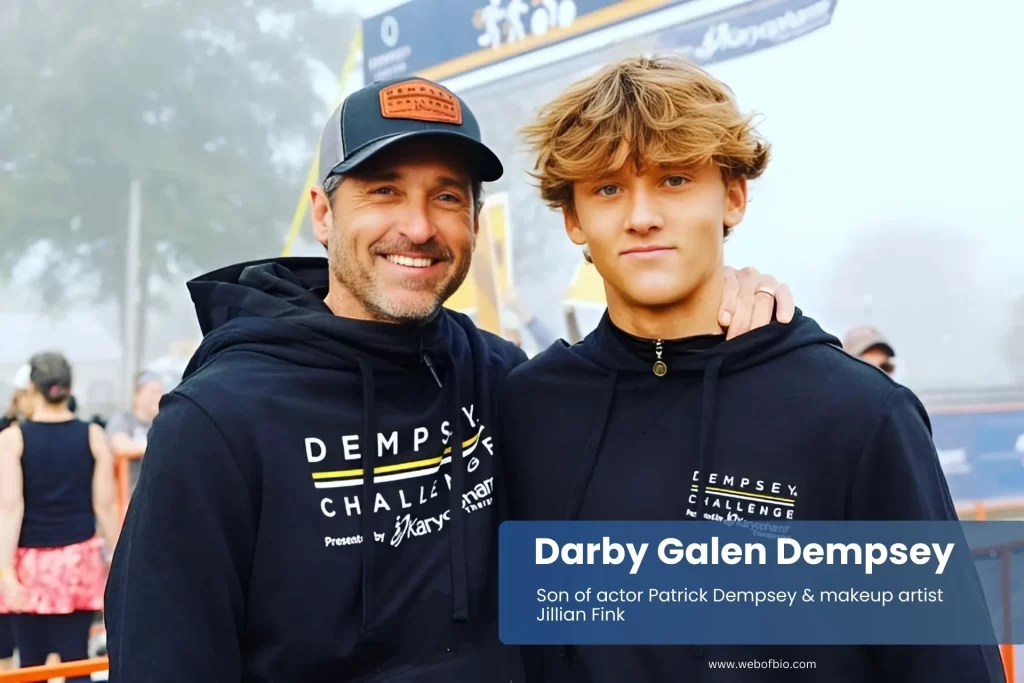 Darby Galen Dempsey and father Patrick Dempsey black sweatshirts, posing.