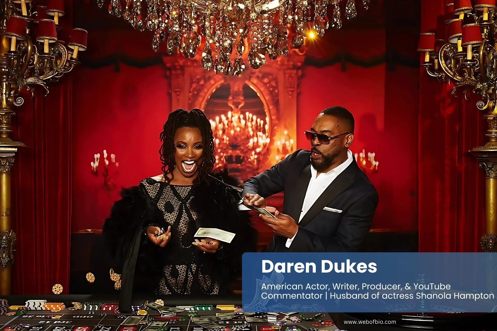 Daren Dukes and Shanola Hampton smiling by casino table.