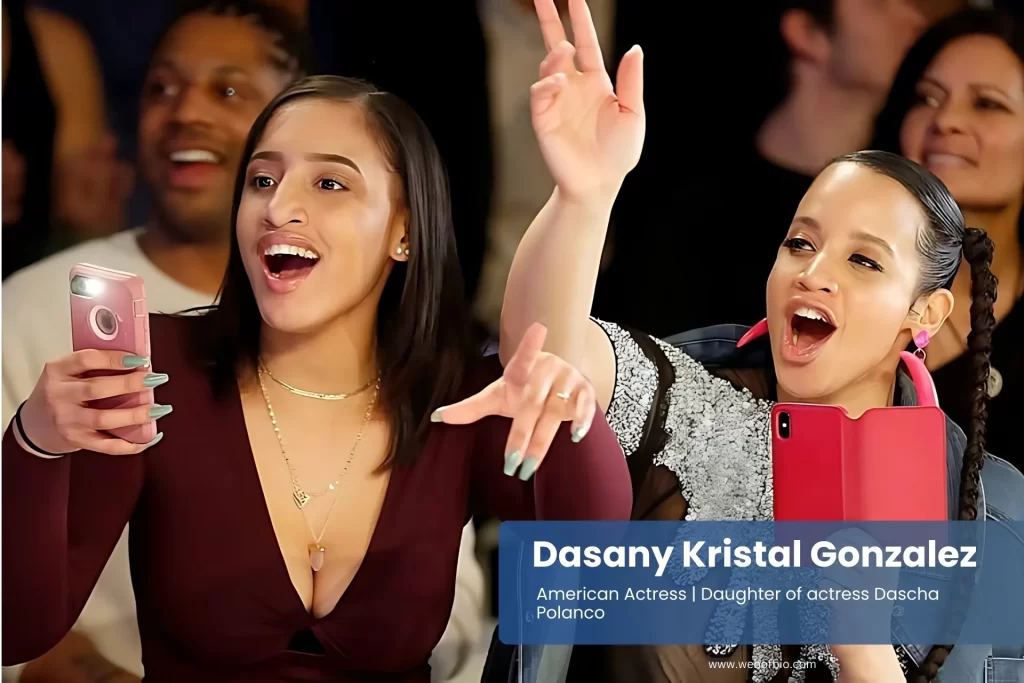 Dasany Kristal Gonzalez taking photo at concert.