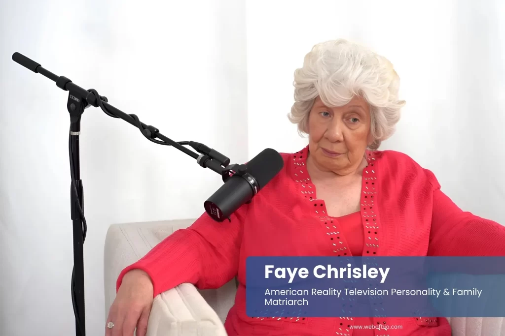 Faye Chrisley sitting with microphone.