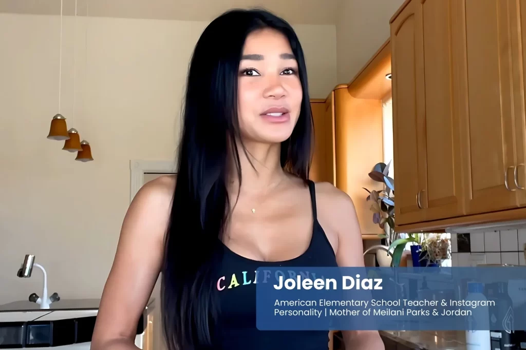 Joleen Diaz black top in modern kitchen.