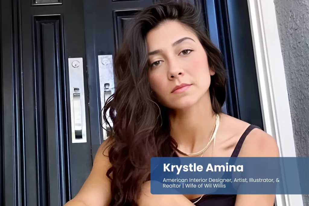 Krystle Amina seated on steps.