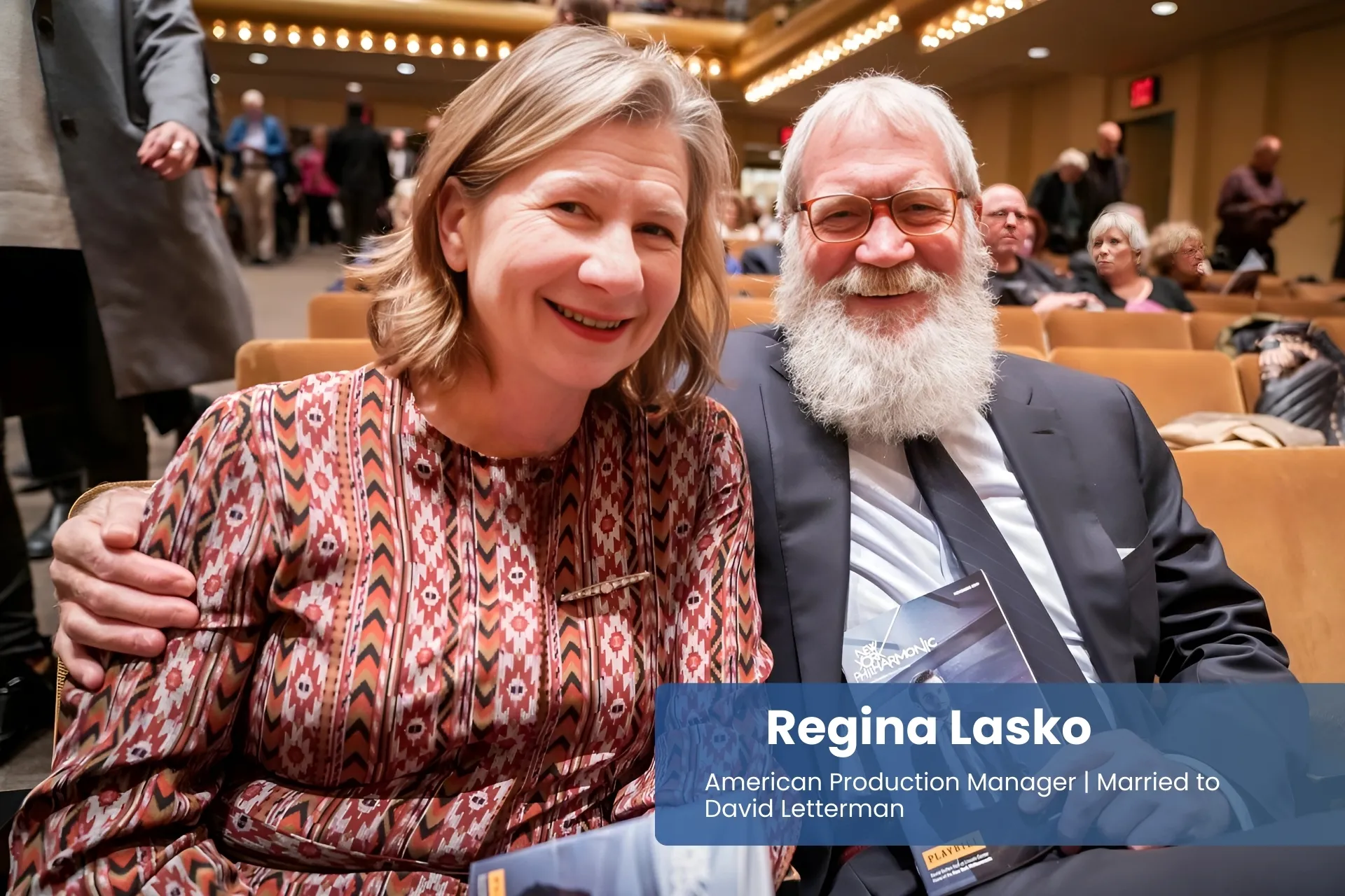 Regina Lasko and David Letterman sitting in theater.