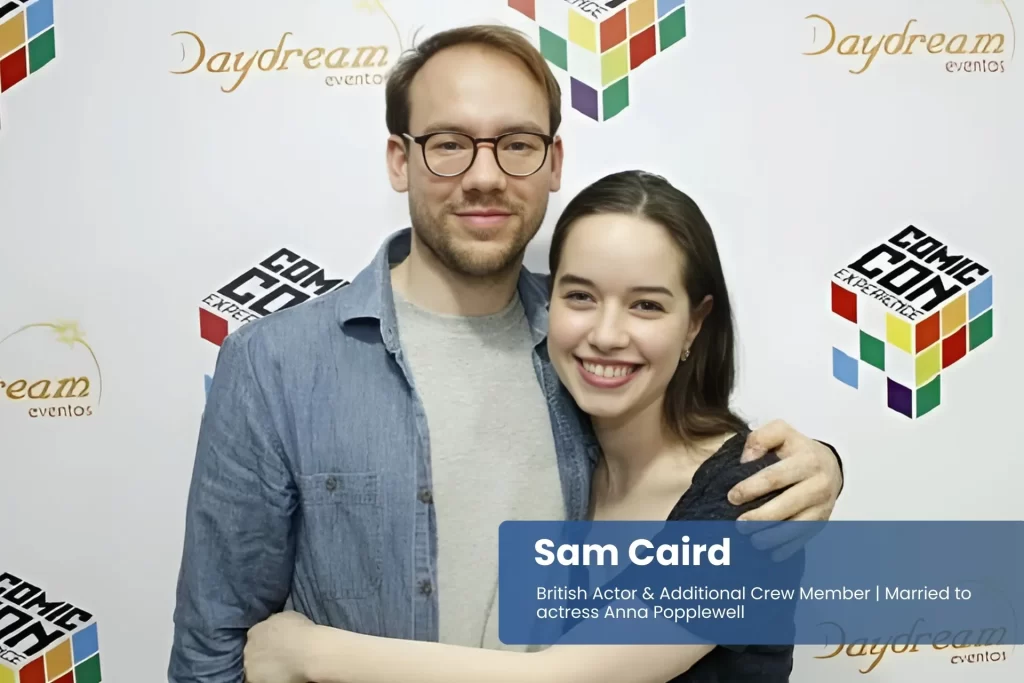 Sam Caird and Anna Popplewell smiling together.
