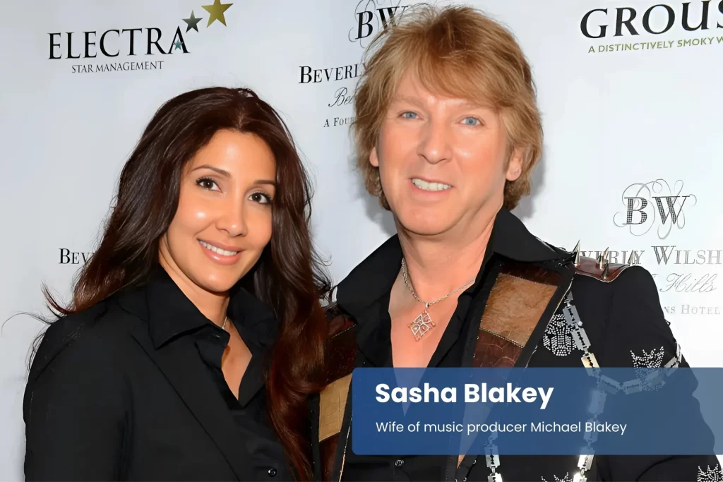 Sasha and Michael Blakey standing and smiling.