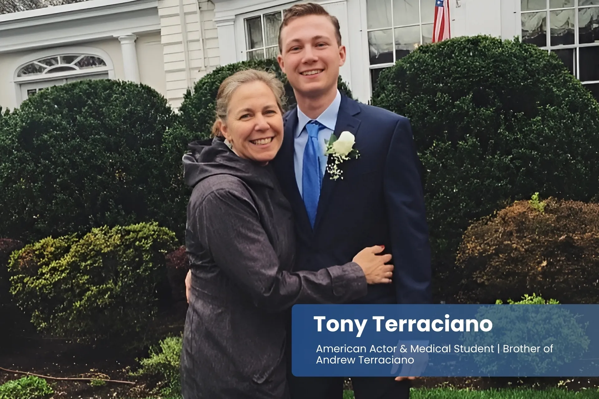 Tony Terraciano and mother in formal attire by house.