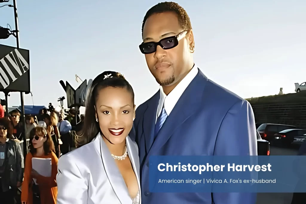 Christopher Harvest and Vivica A Fox suits on red carpet