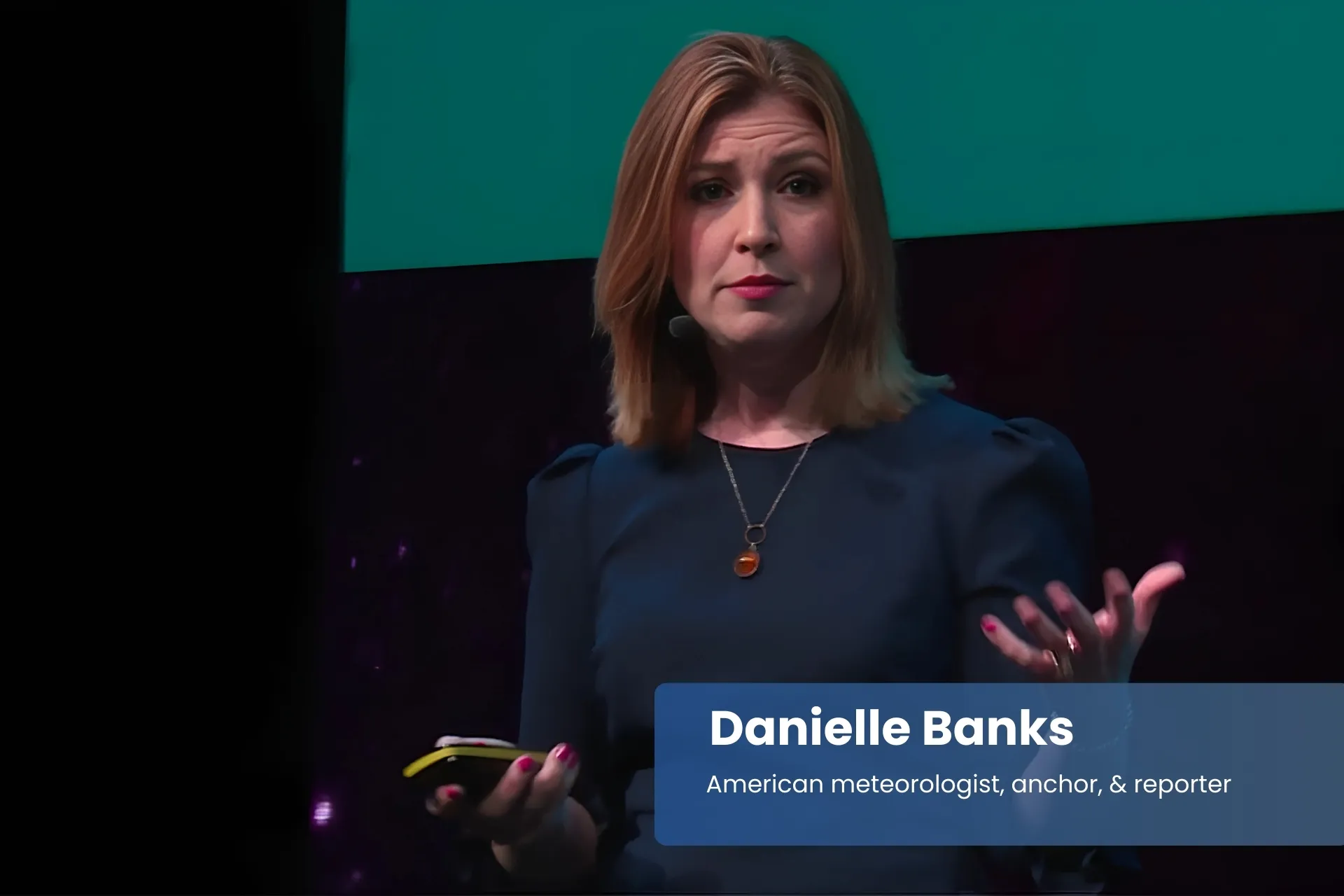 Danielle Banks giving presentation on stage