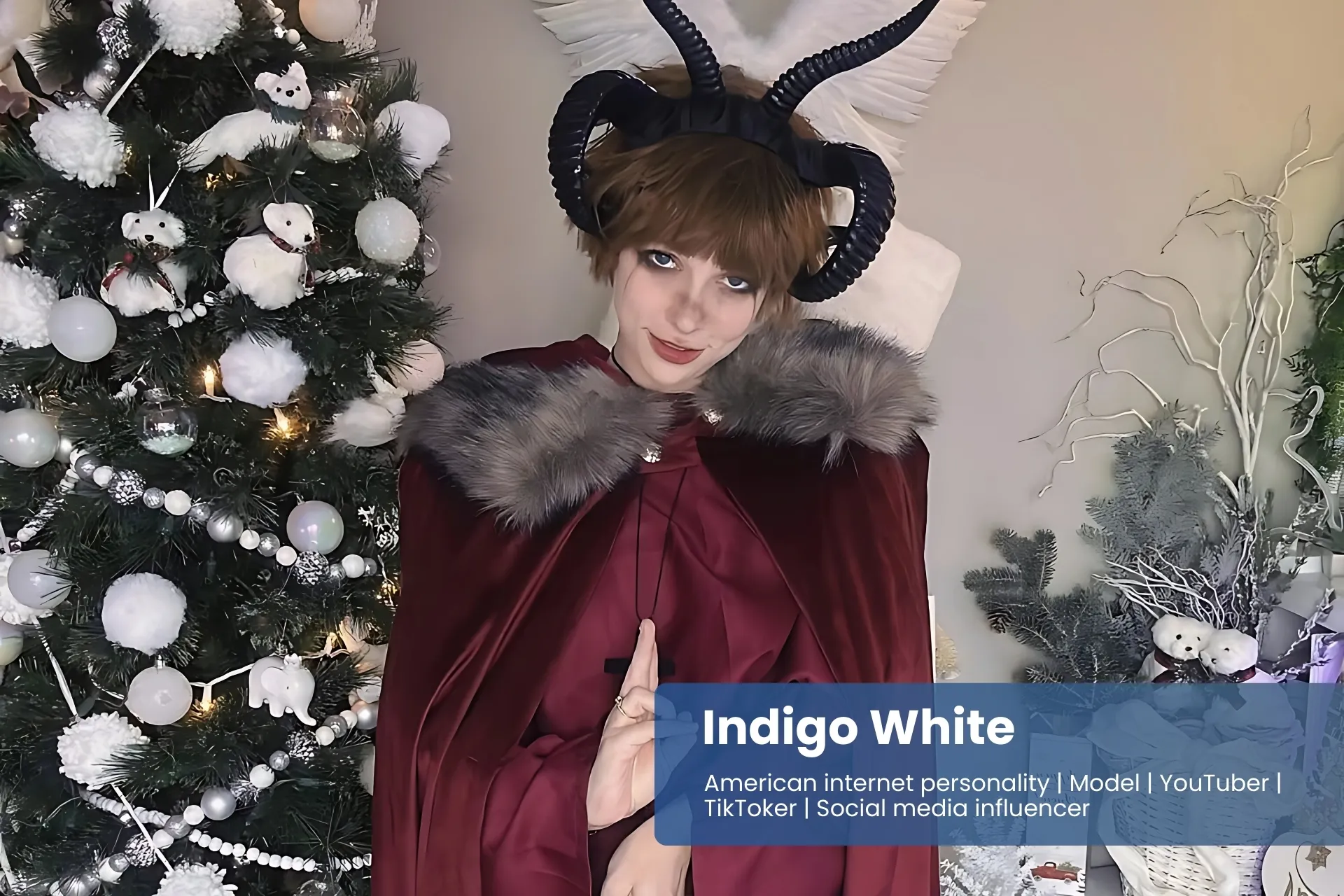 Indigo White red cape and boots, striking pose